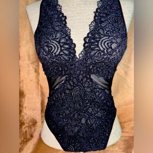 Black, XL , snap crotch. Bodysuit